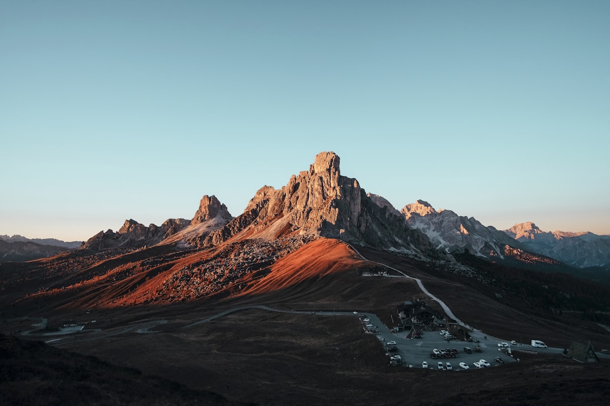 Starlink satellite dish on a Minnesota property surrounded by frozen lakes and boreal forest in winter